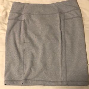 Athlete form fitting gray skirt